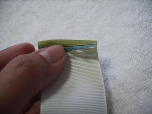 Fold raw edge under