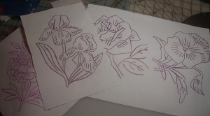 flowers traced with red iron on transfer pencil